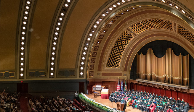 a crowded commencement auditorium